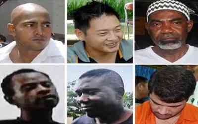 Montagem com fotos de seis dos oito executados à morte por tráfico na Indonésia na terça (28): acima, a partir da esquerda, os australianos Myuran Sukumaran e Andrew Chan o nigeriano Martin Anderson. Abaixo, os nigerianos Jamiu Owolabi Abashin e Sylvester (Foto: AFP Photo)